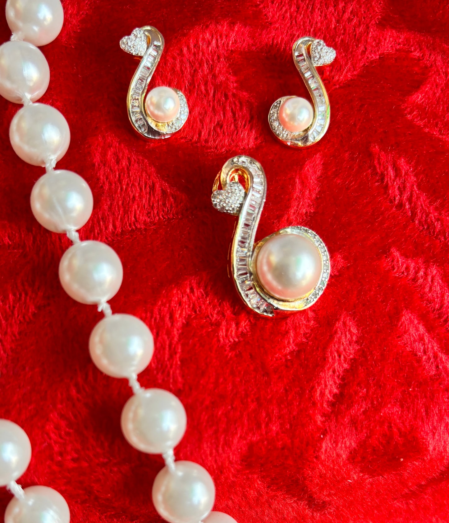 Studded Pendant Set With American Diamond with Embedded Pearl