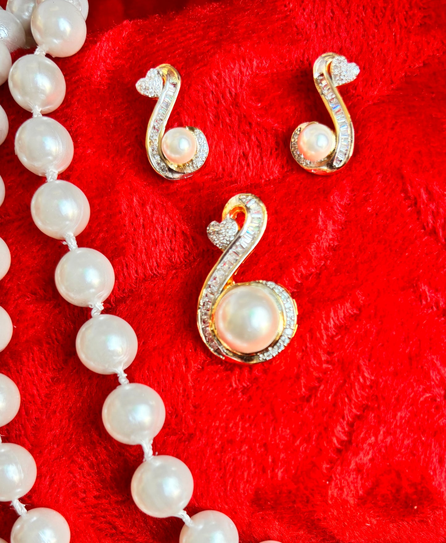Studded Pendant Set With American Diamond with Embedded Pearl